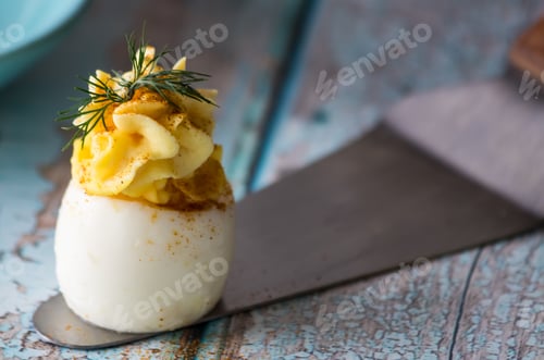 Preview: A Close Up Front View Of Deviled Eggs Ready For Snacking.