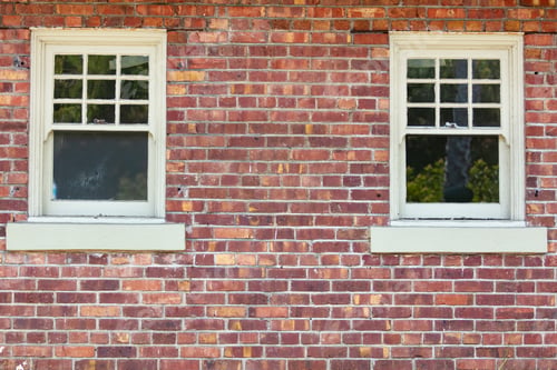 Preview: Vintage Variegated Brick Wall And Two Windows