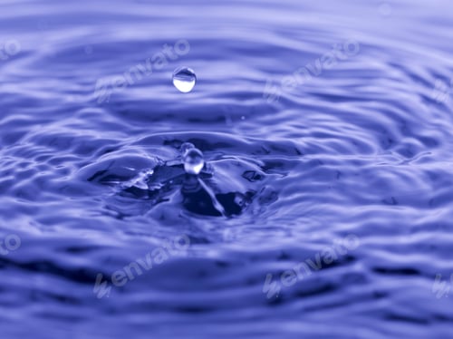 Preview: Water Drop Falling Into Blue Water Abstract Background
