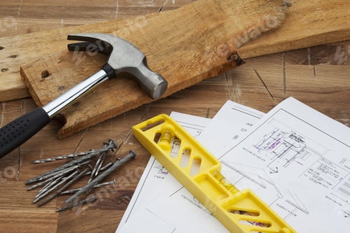 Preview: A Hammer With A Pile Of Nails And A Level