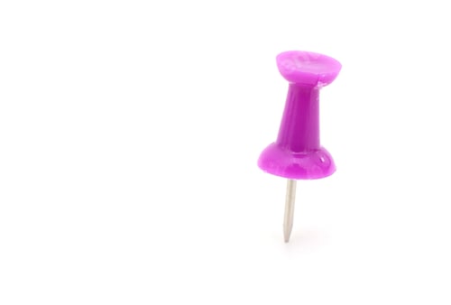 Preview: A Single Violet Push Pin Against A White Background