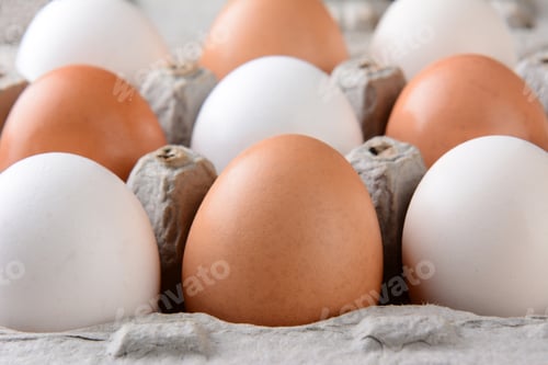 Preview: Closeup Of A Carton Of Brown And White Eggs With Shallow Depth Of Field.