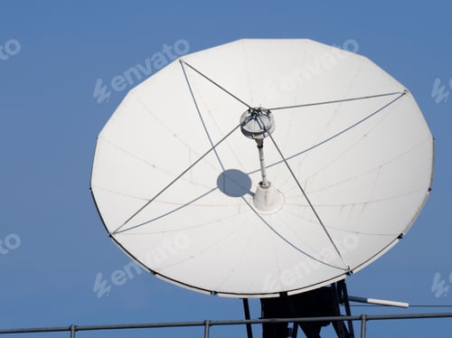 Preview: A White Radio Telecommunications Satellite Dish Facing The Sun