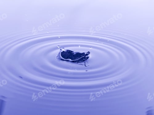 Preview: Close Up Water Droplet Affect The Surface, Forming Rings On The Surface And Making A Perfect