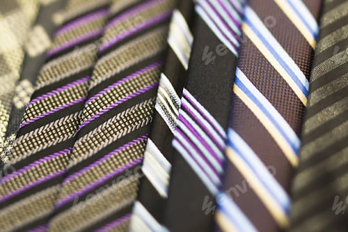 Preview: Colored Striped Silk Designer Ties On Display In A Retail Store