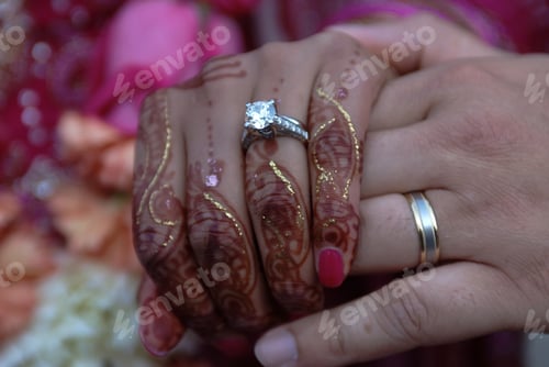 Preview: Bride And Groom Exchanging Rings As Part Of Hindu Wedding Ceremony
