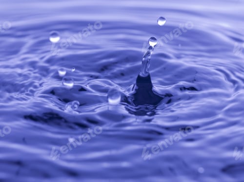 Preview: Water Drop Falling Into Blue Water Abstract Background