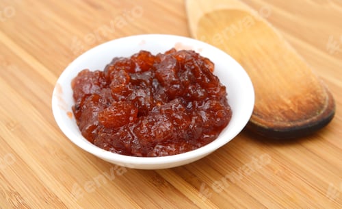 Preview: Wild Strawberry Jam Isolated In Plate On Wooden Board Background