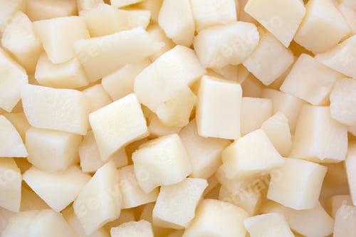 Preview: A Very Close View Of Freshly Diced White Potatoes.