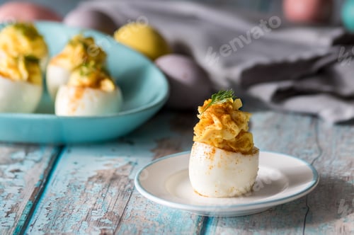 Preview: A Close Up Front View Of Deviled Eggs Ready For Snacking.