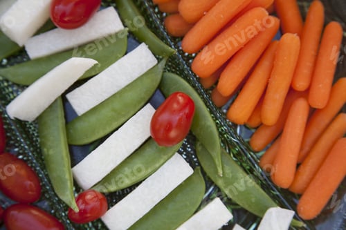 Preview: Plated Carrots, Tomatoes, Jimaca And Snap Peas As A Before Dinner Snack