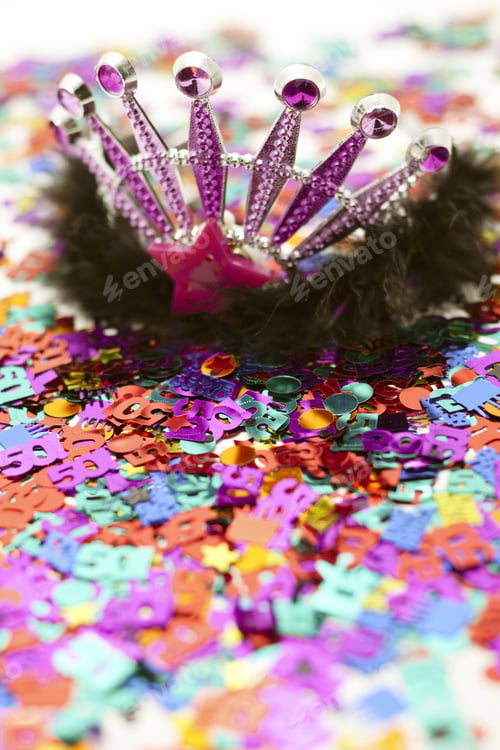 Preview: Selective Focus Confetti Background With A Party Crown