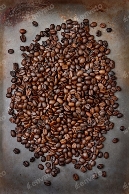 Preview: High Angle Shot Of Fresh Roasted Coffee Beans Ion A Metal Baking Sheet. Vertical Format.
