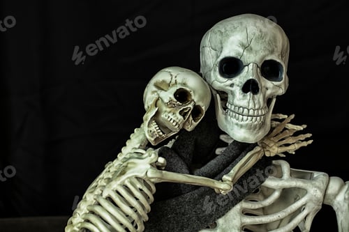 Preview: Two Halloween Skeletons Getting Ready For The Holiday