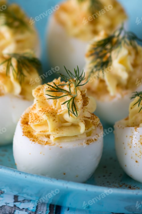 Preview: A Close Up Front View Of Deviled Eggs Ready For Snacking.