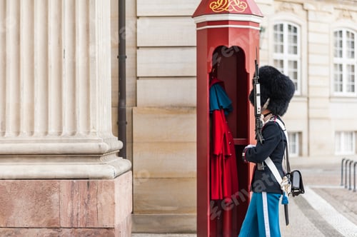Preview: View Of The Amalienborg Square With A Female Royal Guard (Royal Life Guard) Standing In Front Of