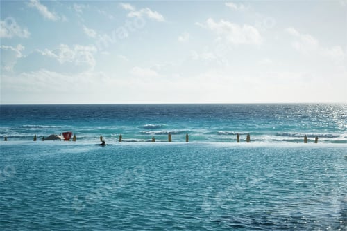 Preview: Man Looking Out Of An Infinity Pool.