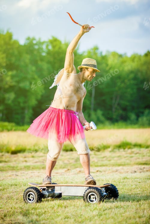 Preview: White Guy With Wings On His Back. He Displays Bow With Arrow. Cupid On Valentine'S Day