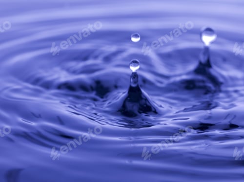 Preview: Water Drop Falling Into Blue Water Abstract Background
