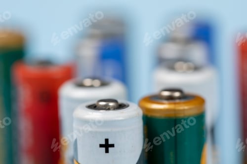 Preview: Close Up Of A Collection Of Colorful Aa Batteries With Selective Focus