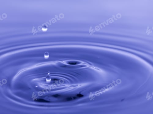 Preview: Water Drop Falling Into Blue Water Abstract Background