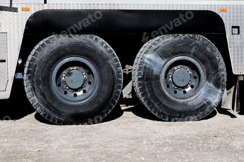 Preview: The Huge Wheels And Tires Of A Large Mobile Crane Or Truck