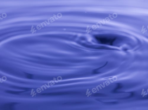 Preview: Water Drop Falling Into Blue Water Abstract Background