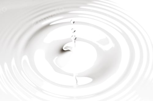 Preview: Close Up Water Droplet Affect The Surface, Forming Rings On The Surface And Making A Perfect