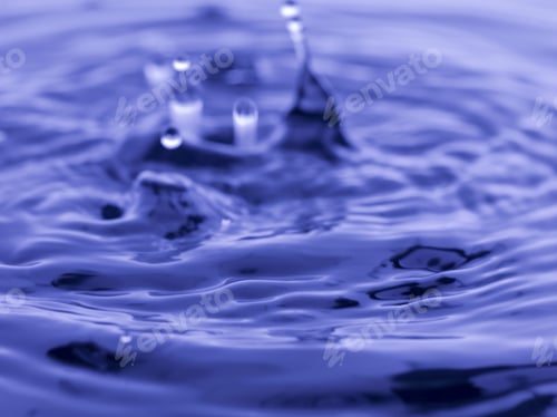 Preview: Water Drop Falling Into Blue Water Abstract Background