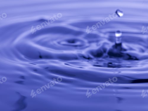 Preview: Water Drop Falling Into Blue Water Abstract Background