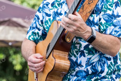 Preview: Guitar Player Strumming A Song On Stage