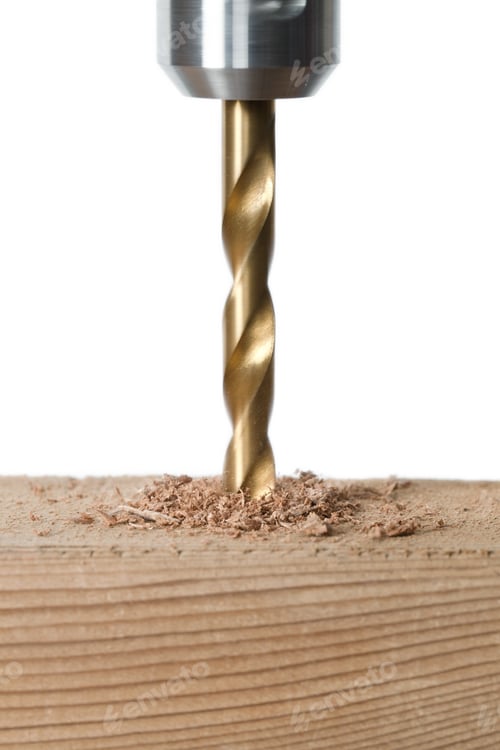 Preview: Close-Up Image Of A Drilling Hole On A Wooden Plank Isolated On A White Background