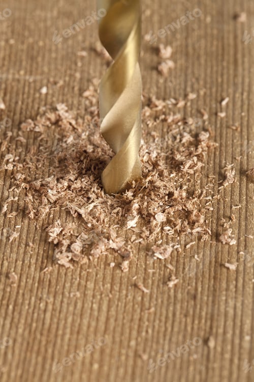 Preview: An Isolated Cordless Drill Drilling Into Wood