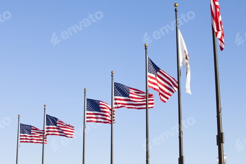 Preview: A Horizontal Image Of American Flag On The Pole With A Blue Sky Background