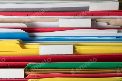 Preview: Closeup Of File Folders In An Open Filing Cabinet With Blank Labels