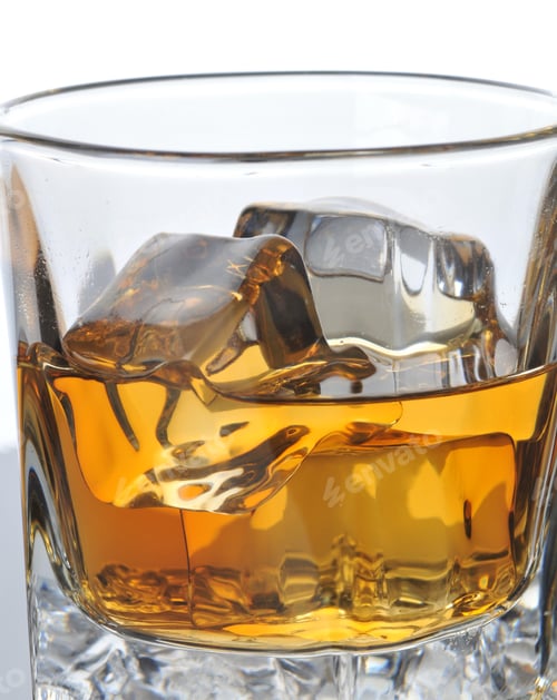 Preview: Whiskey In Glass With Ice Cubes And Condensation, Close Up With White Background