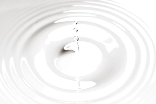 Preview: Close Up Water Droplet Affect The Surface, Forming Rings On The Surface And Making A Perfect