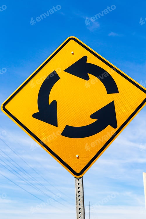 Preview: Bethany Beach, De, Usa - April 18, 2015: Traffic Circle Ahead Yellow Sign.