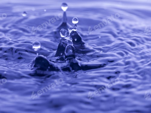 Preview: Water Drop Falling Into Blue Water Abstract Background