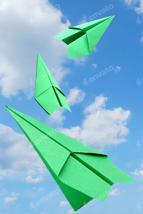 Preview: Green Airplanes Against Blue Sky