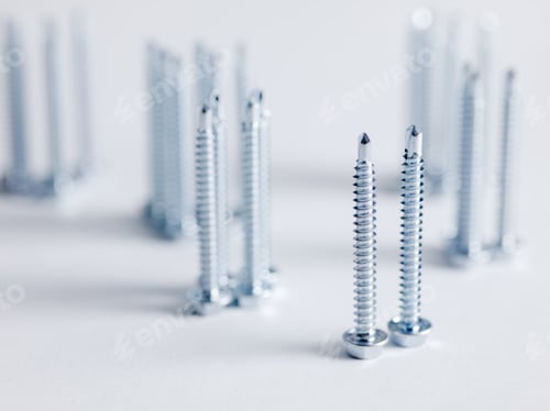 Preview: Screws And Bolts On White Background