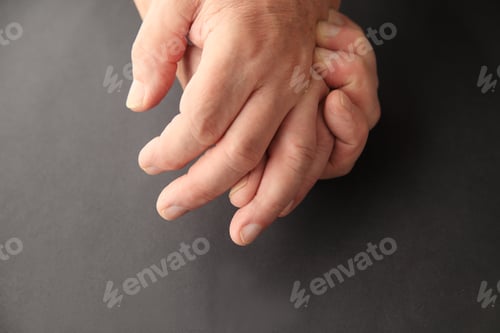 Preview: Senior Man Holding His Painful Hand