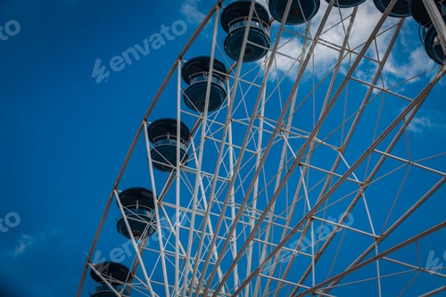 Preview: A Ferris Wheel At The Ocean At An Amusement Rides Area On The Boardwalk.