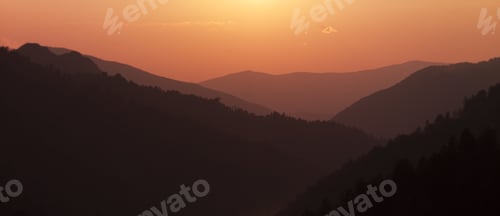 Preview: Scenic View Of Silhouette Of Mountain Range.
