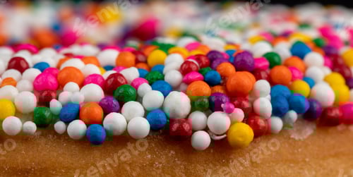 Preview: Extreme Closeup View Of Candy Sprinkles On A Donut