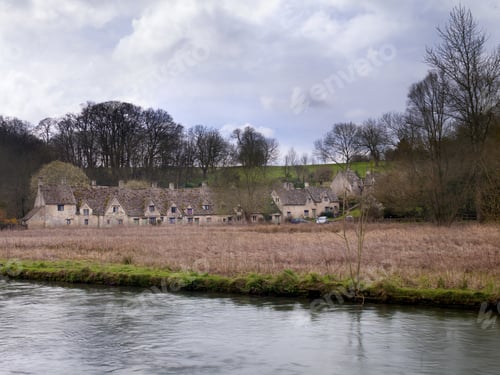 Preview: Rows And Rows Of Cottages In The Cotswolds Across The River.