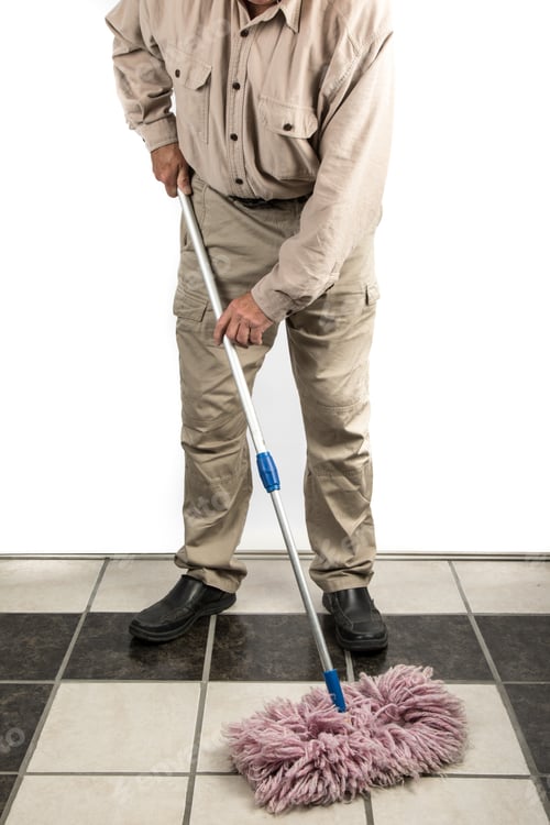 Preview: Unidentified Man In A Brown Janitorial Uniform Cleaniong A Tile Floor With A Red String Dust Mop