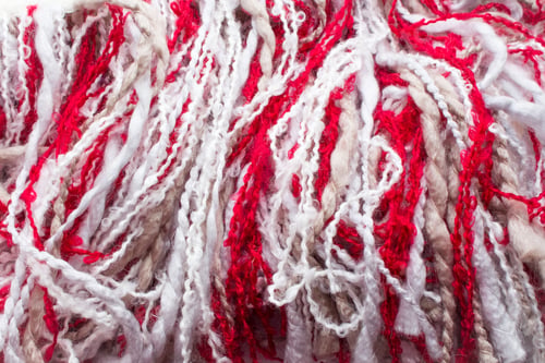 Preview: Close Up Warm White And Red Blanket