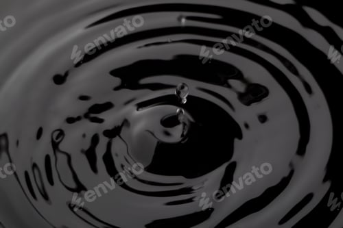 Preview: Close Up Water Droplet Affect The Surface, Forming Rings On The Surface And Making A Perfect