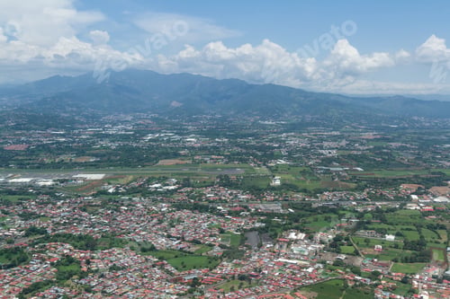 Preview: San Jose, Costa Rica - May 24 : Aerial View Of The City Of Alajuela From The Interior Of A Small